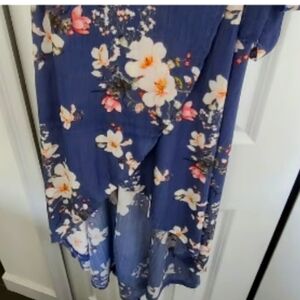 Lavender floral wrap around skirt that ties at waist.